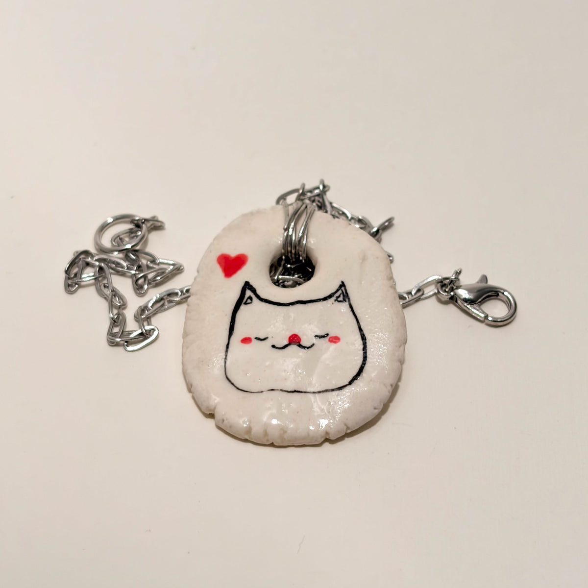 sleepy cat necklace